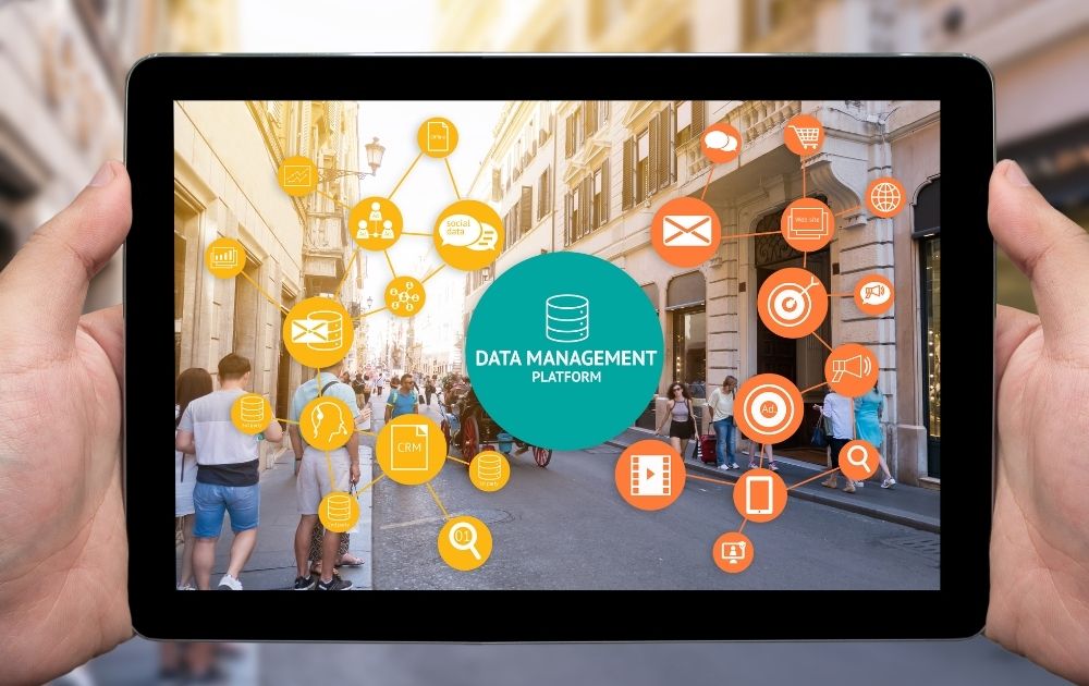 hands holding a tablet with Data Management Platform concept