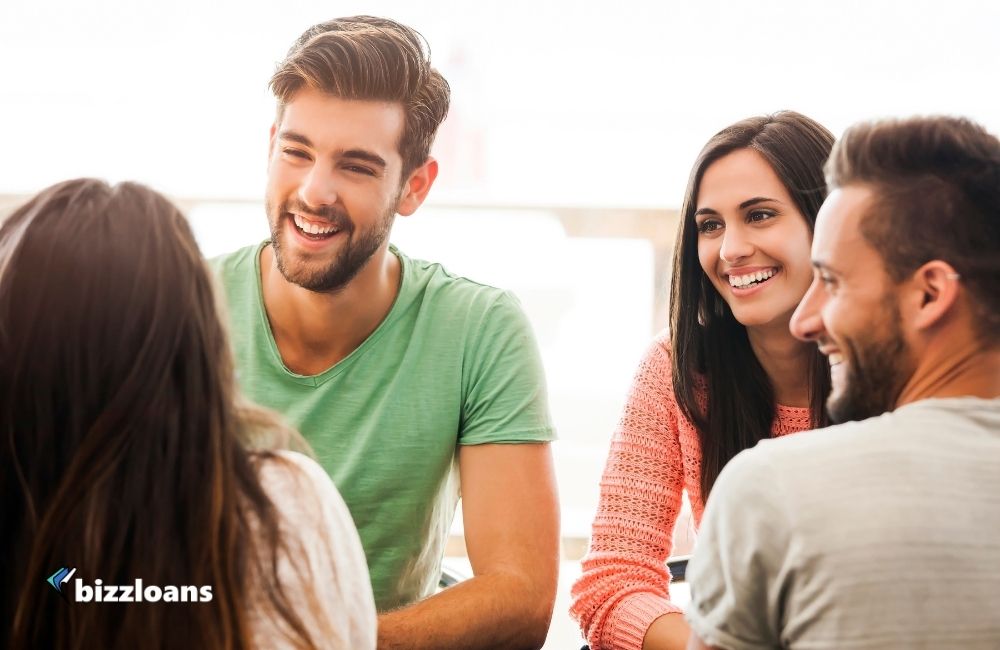 business owners talking and smiling with their friends