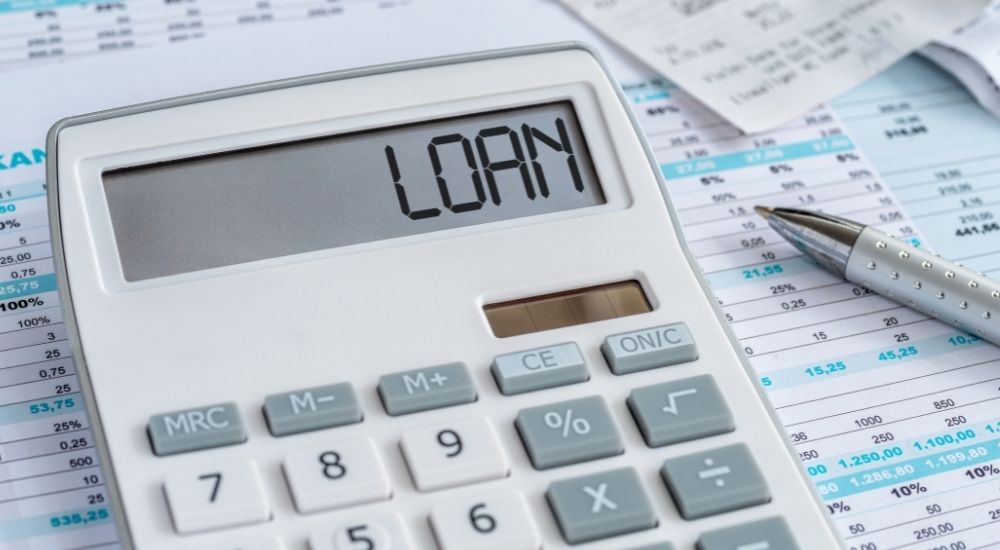 calculator with the word Loan on display