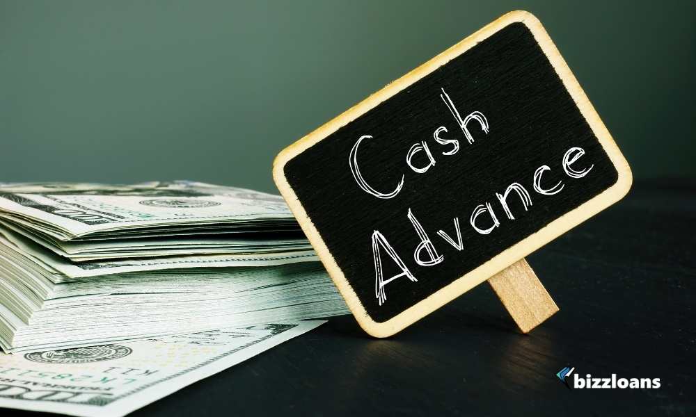 cash advance text on sign board with cash on the side
